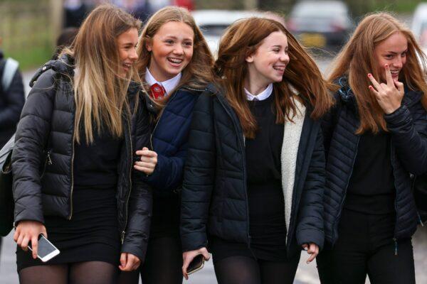 Pupils return to Kelso High School for the first time since the start of the CCP virus lockdown in Kelso, Scotland, on Aug. 11, 2020. (Jeff J Mitchell/Getty Images)