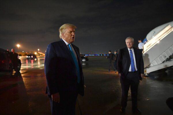 President Donald Trump, next to White House chief of staff Mark Meadows, speaks to reporters upon arrival at Andrews Air Force Base in Maryland on Sept. 3, 2020. (Mandel Ngan/AFP via Getty Images)