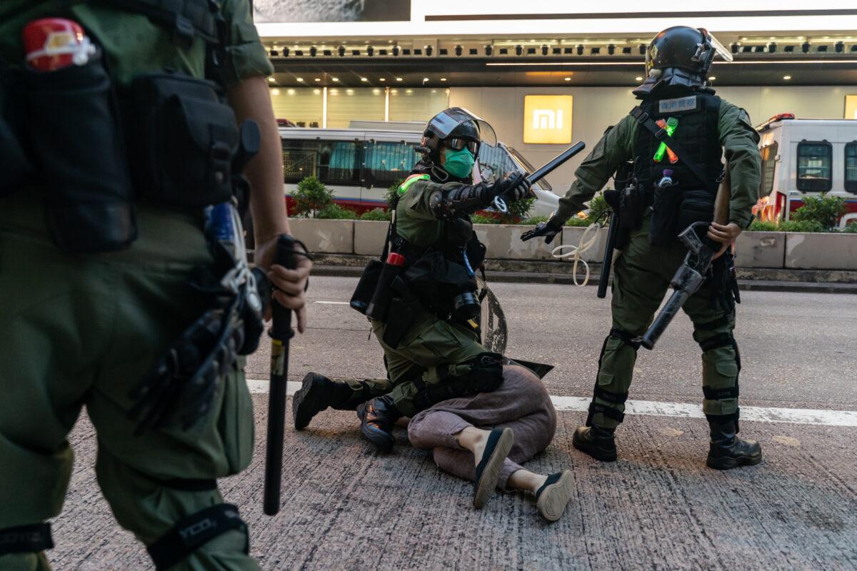 Riot police arrest a man during an anti-government protest in Hong Kong, on Sept. 6, 2020. (Anthony Kwan/Getty Images)