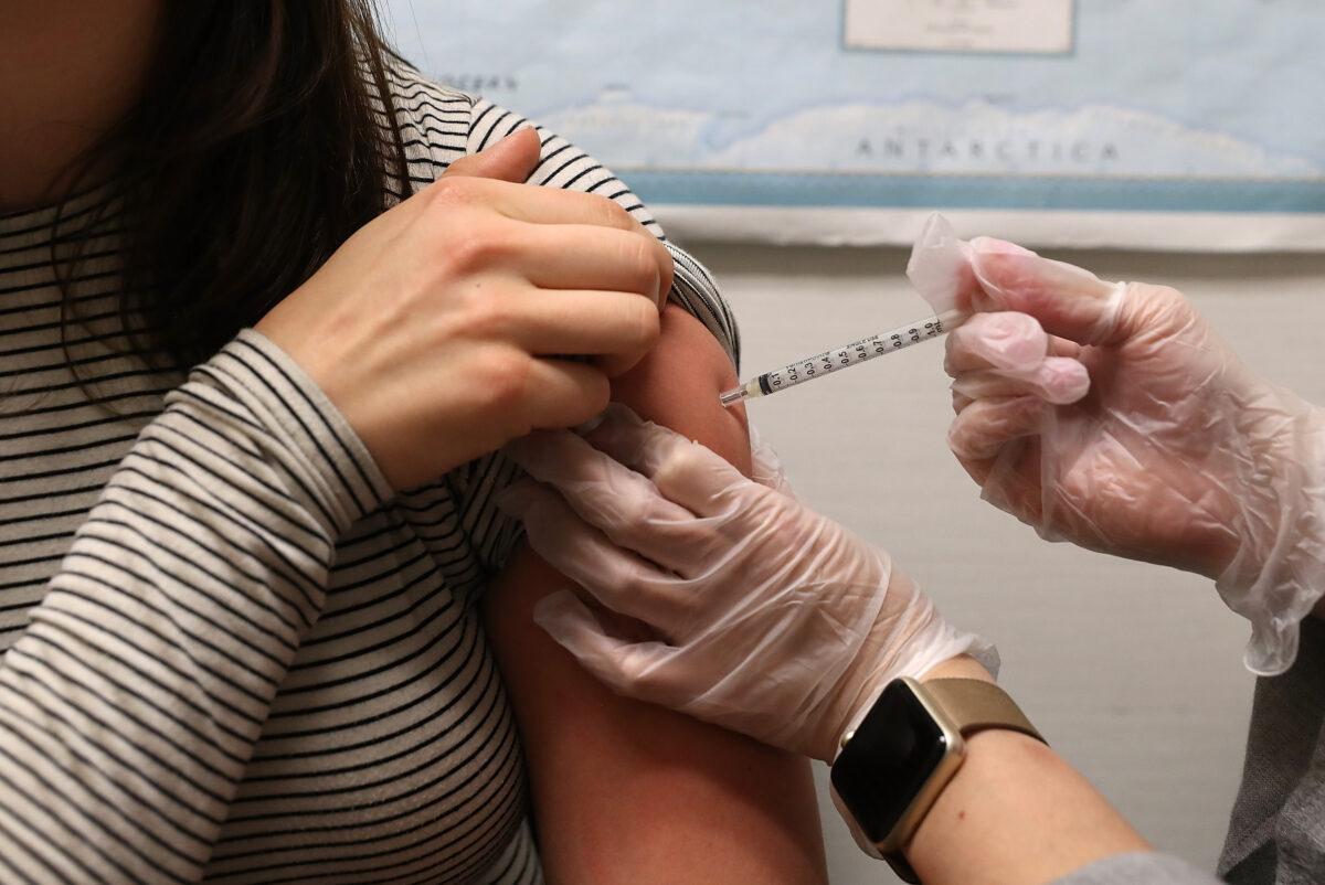 A woman receives a flu shot in San Francisco, Calif., on Jan. 22, 2018. (Justin Sullivan/Getty Images)