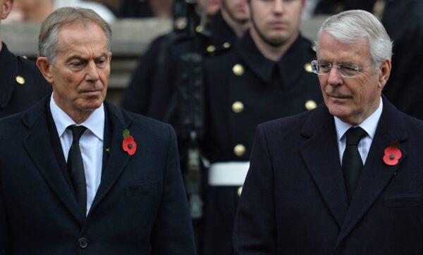 Former British Prime Ministers Tony Blair and John Major attend the Remembrance Sunday ceremony at the Cenotaph, in London, on Nov. 8, 2015. (Glyn Kirk/AFP via Getty Images)