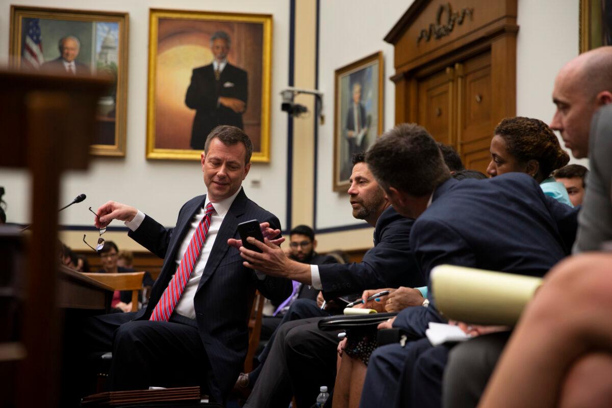 Then-FBI official Peter Strzok confers with his legal counsel before a joint committee hearing on Capitol Hill in Washington on July 12, 2018. (Alex Edelman/Getty Images)