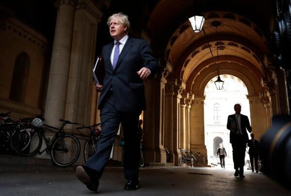 Britain's Prime Minister Boris Johnson walks to his office in Downing Street after a cabinet meeting in London, on Sept. 15, 2020. (Frank Augstein/AP Photo)