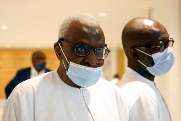 Former President of the International Association of Athletics Federations (IAAF) Lamine Diack arrives for the verdict in his trial at the Paris courthouse on Sept. 16, 2020. (Charles Platiau/Reuters)