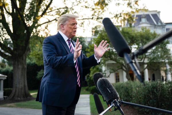 President Donald Trump stops and takes questions from reporters on his way to Marine One on the South Lawn of the White House in Washington, on Sept. 22, 2020. (Drew Angerer/Getty Images)