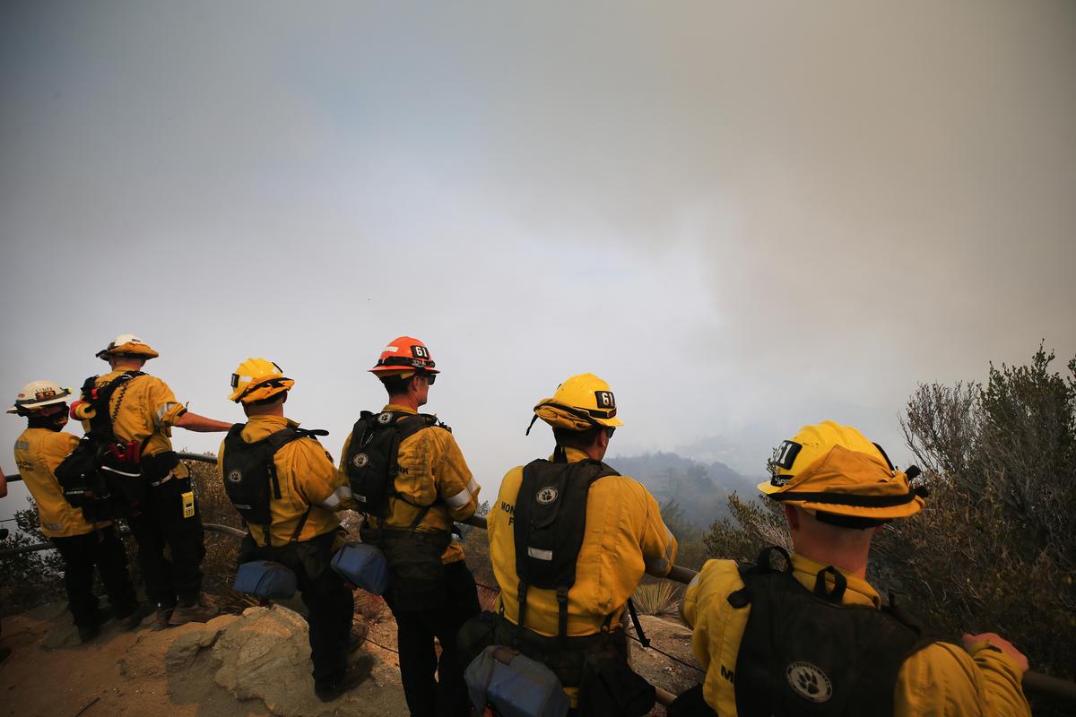 Firefighters keep watch near Mount Wilson Observatory as the Bobcat Fire burns in nearby Angeles National Forest near Pasadena, Calif., on Sept. 16, 2020. (Mario Tama/Getty Images)
