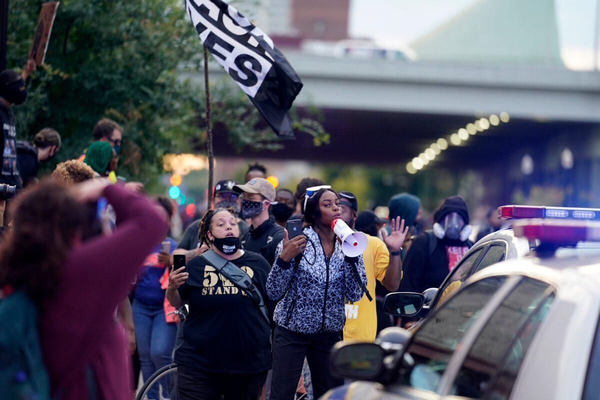 Black Lives Matter protesters march, in Louisville. Ky., on Sept. 25, 2020. (Darron Cummings/AP Photo)