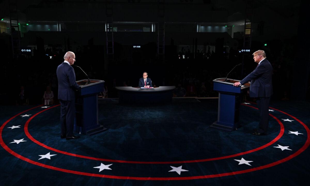 President Donald Trump, right, and Democratic presidential nominee Joe Biden take part in the first presidential debate at Case Western Reserve University and Cleveland Clinic in Cleveland, Ohio, on Sept. 29, 2020. (Olivier Douliery/POOL/AFP via Getty Images)