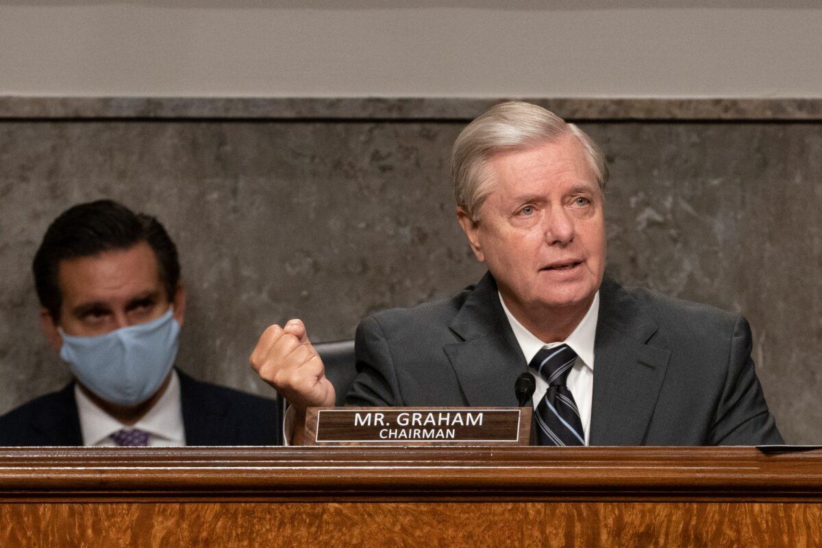 Chairman Lindsey Graham (R-S.C.) questions former FBI Director James Comey, who was speaking remotely, during a Senate Judiciary Committee hearing in Washington on Sept. 30, 2020. (Ken Cedeno/Pool/AFP via Getty Images)