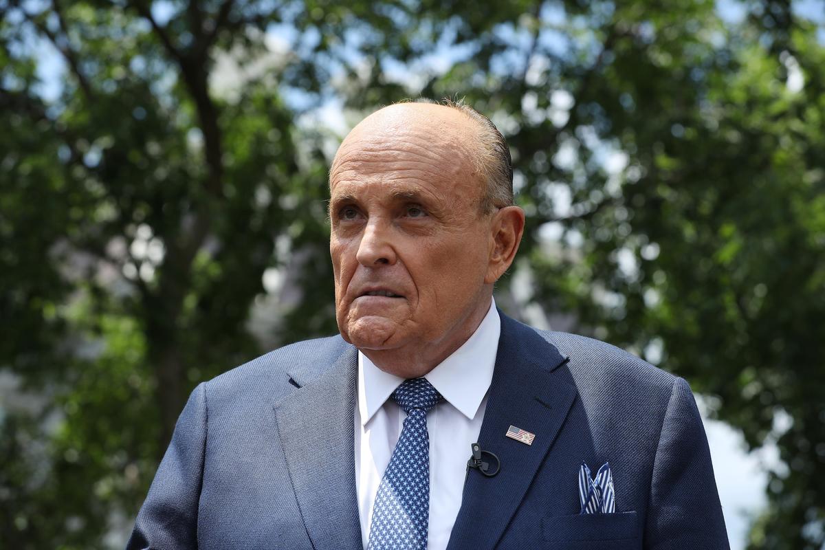 President Donald Trump's lawyer and former New York City Mayor Rudy Giuliani speaks to reporters outside the White House on July 1, 2020. (Chip Somodevilla/Getty Images)