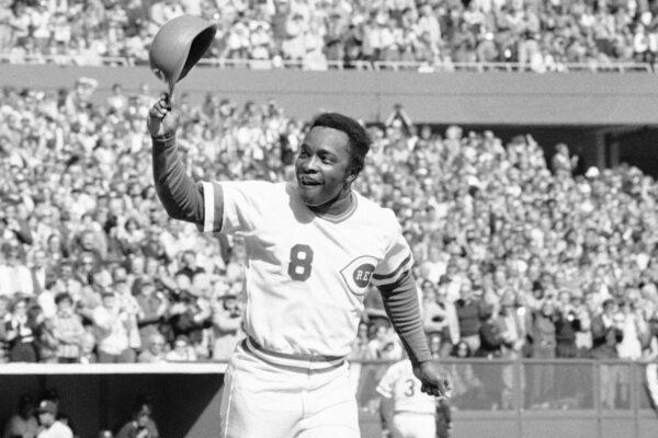 Cincinnati second baseman Joe Morgan tips his helmet to the fans as he rounds the bases after a homer in the first inning against the New York Yankees at Riverfront Stadium in Cincinnati, Ohio, on Oct. 16, 1976. (AP Photo)