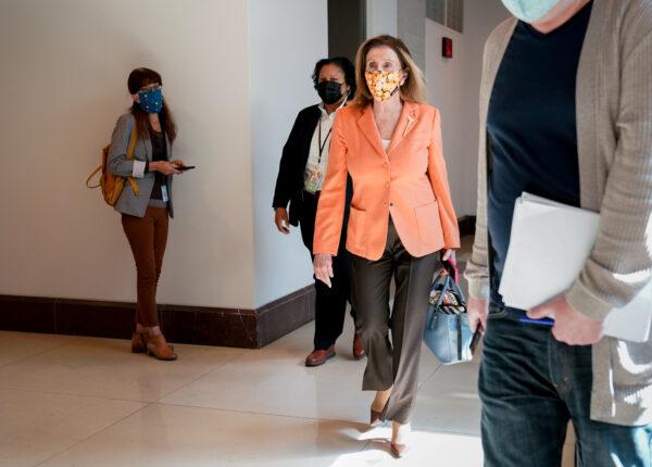 House Speaker Nancy Pelosi (D-Calif.) departs a news conference on Capitol Hill in Washington on Oct. 8, 2020. (Erin Scott/Reuters)