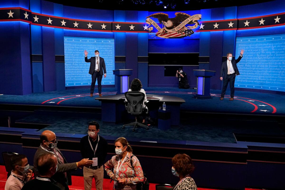 Mock debaters perform onstage as preparations take place for the second presidential debate at Belmont University, in Nashville, Tenn., on Oct. 21, 2020. (Patrick Semansky/AP Photo)
