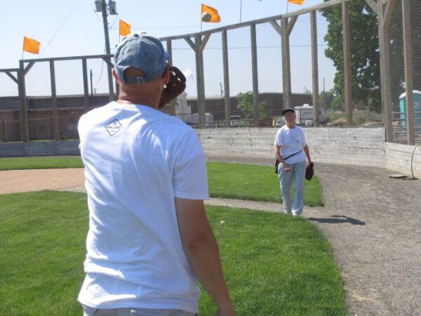 Playing catch on day 152 with Mary Moore, who formerly played in the All-American Girls Professional Baseball League.