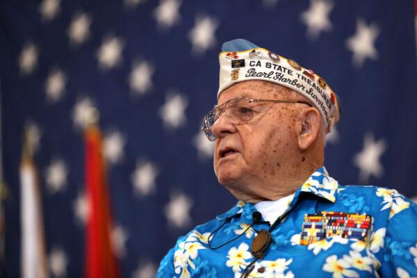 To honor veterans, we can listen to their stories. Pearl Harbor survivor Mickey Ganitch speaks during a Veterans Day celebration aboard the USS Hornet on Nov. 11, 2019, in Alameda, California. (Justin Sullivan/Getty Images)