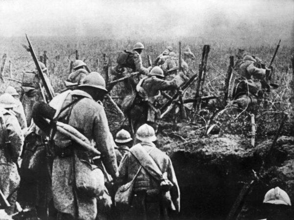 French soldiers moving to attack from their trench during the 1916 Battle of Verdun in World War I. The battle won by the French in November 1916 cost the lives of 163,000 French soldiers and 143,000 German soldiers. (AFP via Getty Images)