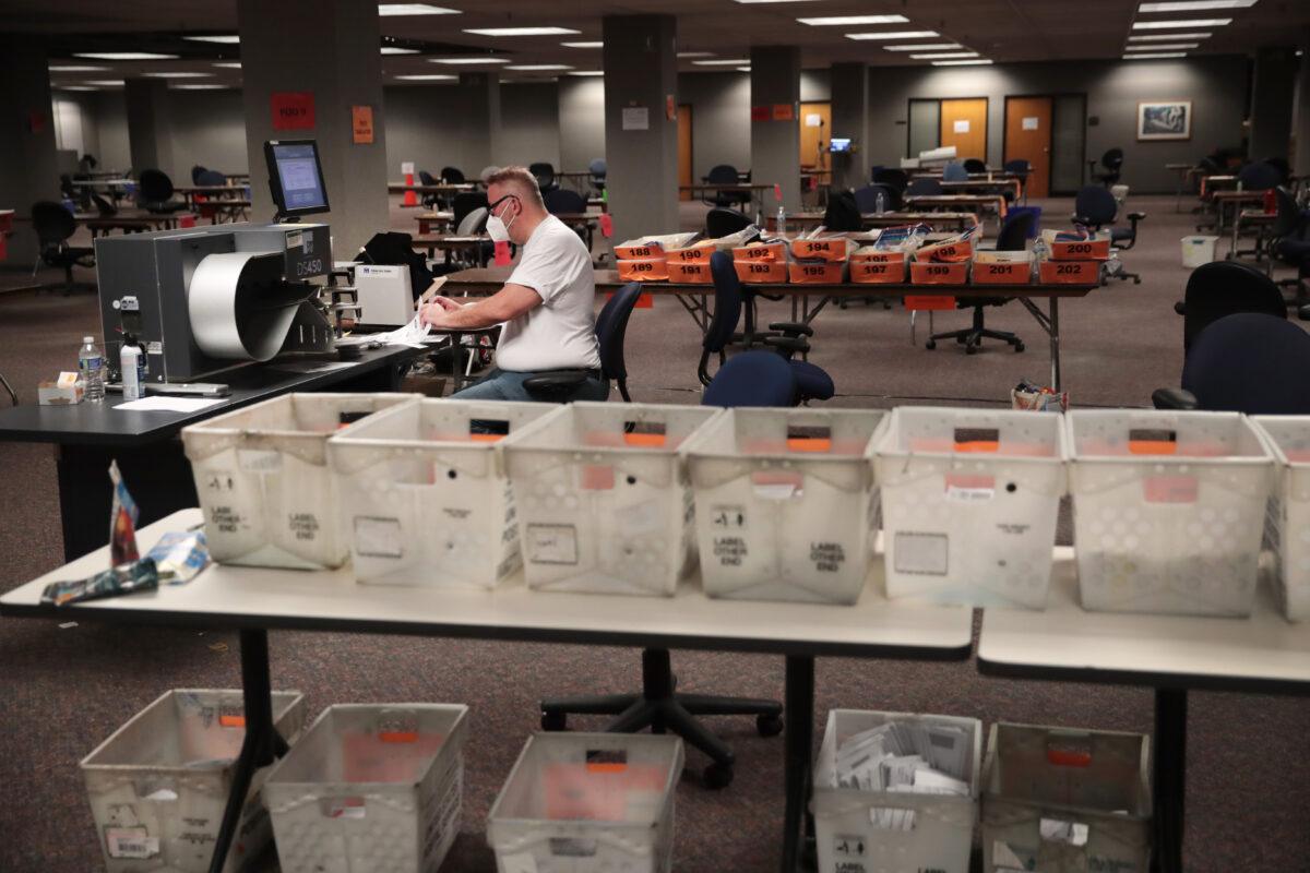 Election officials count absentee ballots in Milwaukee, Wis., on Nov. 4, 2020. (Scott Olson/Getty Images)