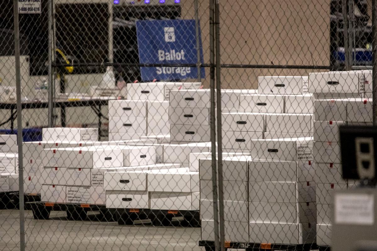 Boxes of counted ballots are seen locked in the ballot storage area at the Philadelphia Convention Center in Philadelphia, Pa., on Nov. 6, 2020. (Chris McGrath/Getty Images)