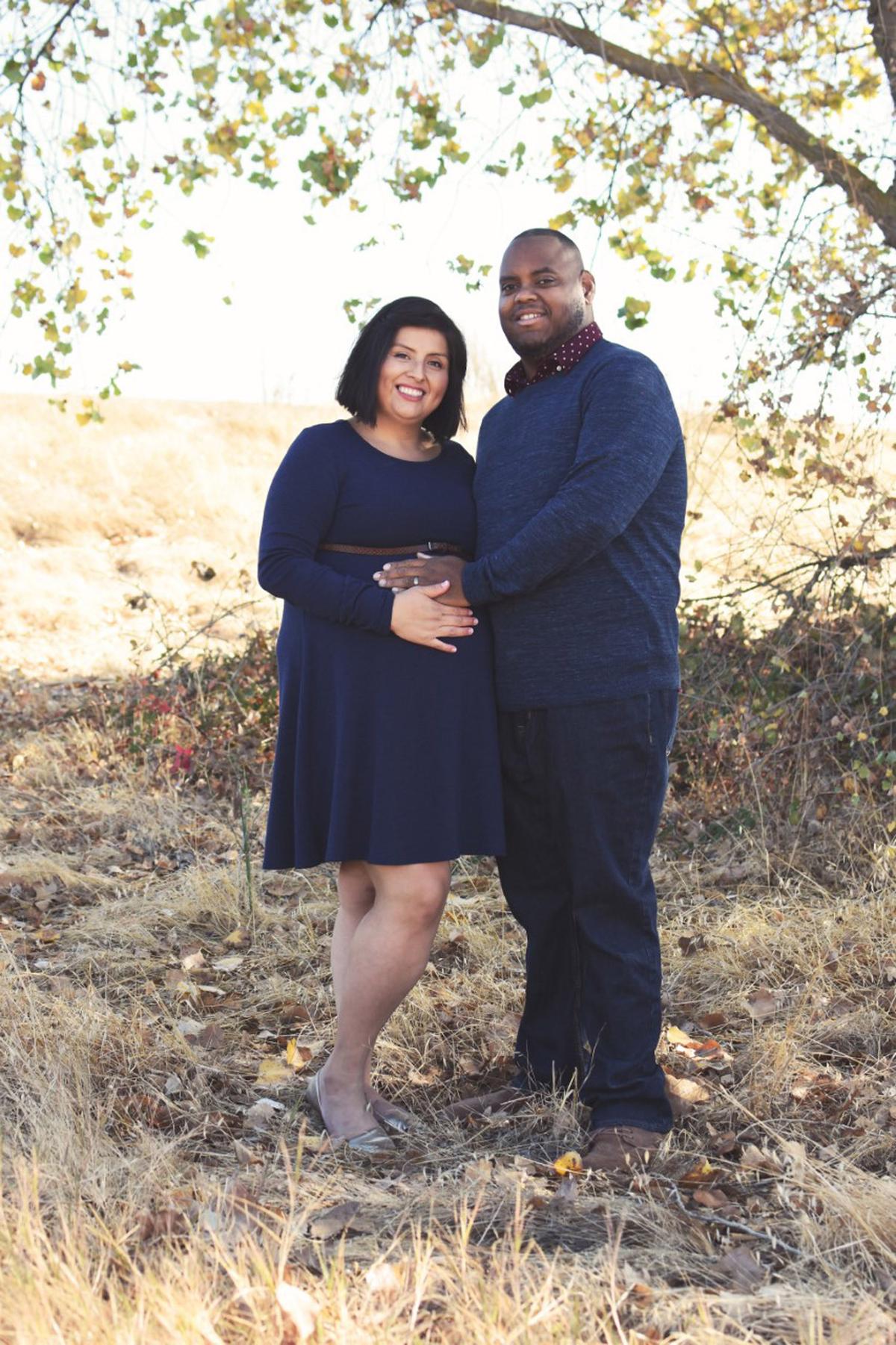 Lizeth and her husband while she was pregnant with the twins. (Caters News)