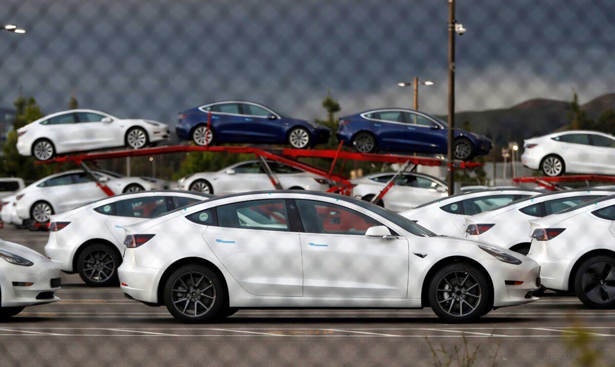 New Tesla electric vehicles are seen in a lot at Tesla’s primary vehicle factory in Fremont, Calif., on May 11, 2020. (Stephen Lam/Reuters)
