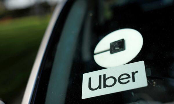 An Uber logo is shown on a rideshare vehicle in Los Angeles on Aug. 20, 2020. (Mike Blake/Reuters)