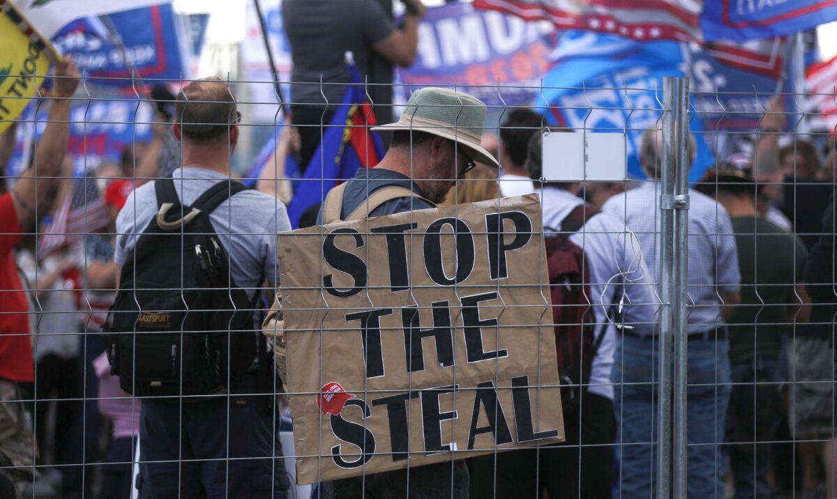 Supporters of President Donald Trump demonstrate at a ‘Stop the Steal’ rally in front of the Maricopa County Elections Department office in Phoenix, on Nov. 7, 2020. (Mario Tama/Getty Images)