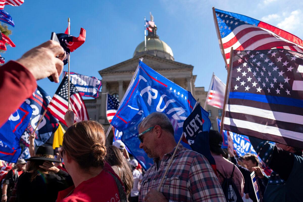 Supporters of President Donald Trump rally outside of the Georgia State Capitol in Atlanta, Ga., on Nov. 21, 2020. (Ben Gray/AP Photo)