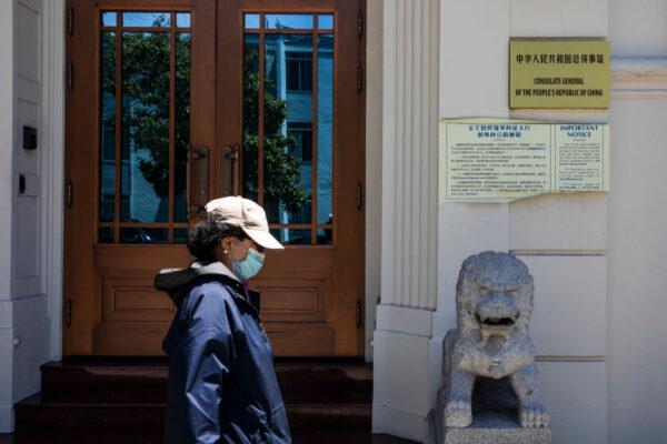 A person walks past the Chinese Consulate in San Francisco on July 23, 2020. (Philip Pacheco/AFP via Getty Images)