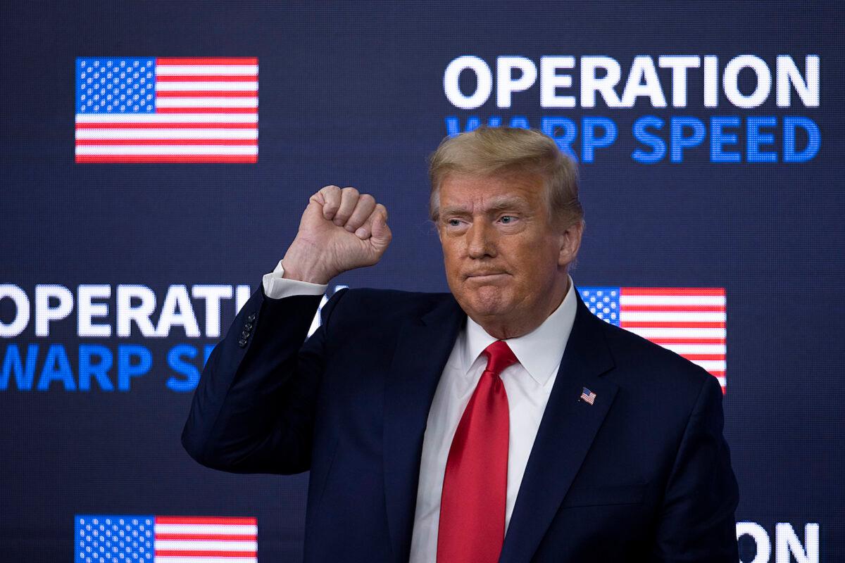 President Donald Trump greets the crowd before he leaves at the Operation Warp Speed Vaccine Summit in Washington, on Dec. 08, 2020. (Tasos Katopodis/Getty Images)