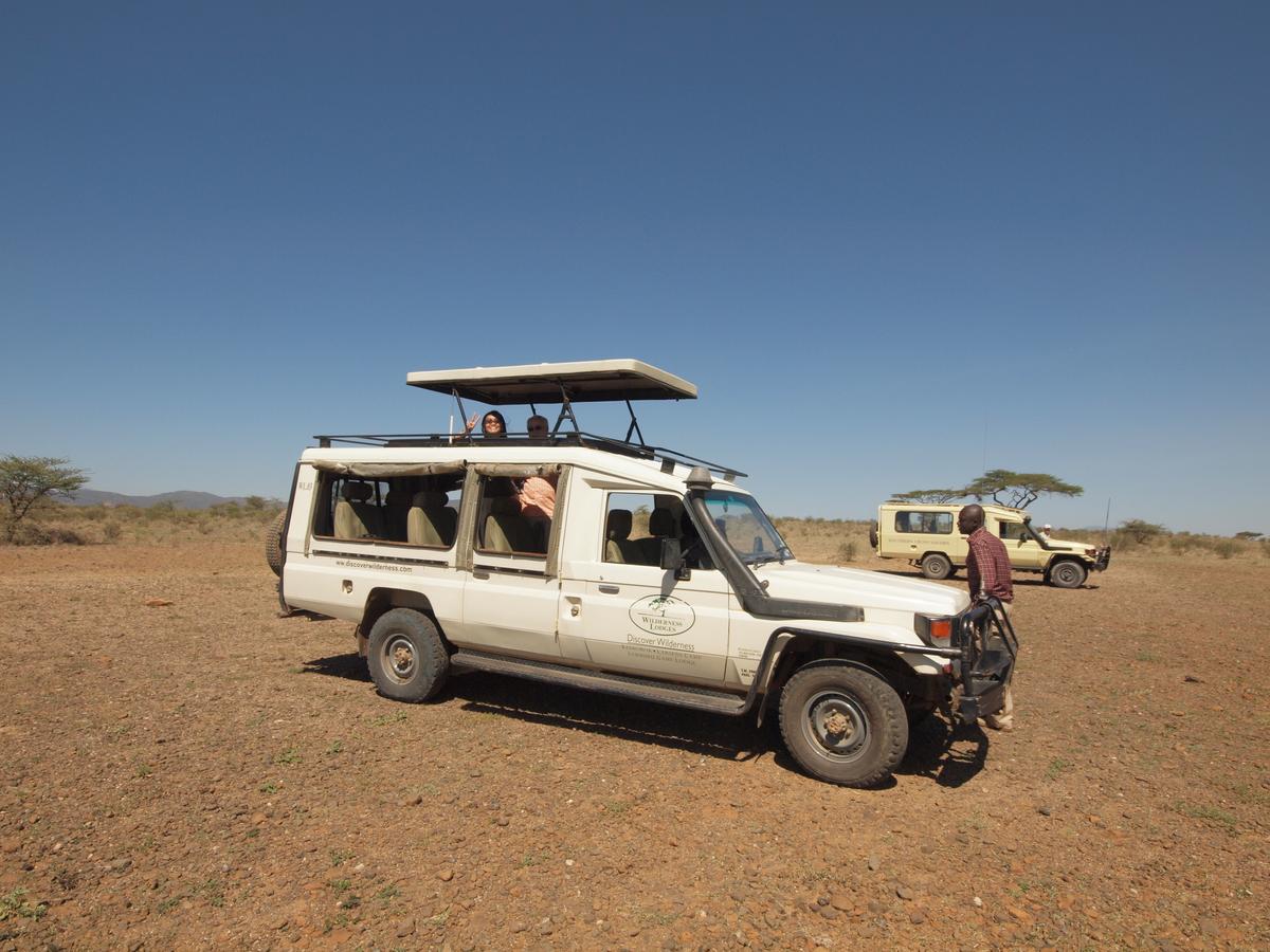 The typical Toyota safari jeep with a pop-top allowing passengers to stand to view game while remaining in the shade as well. (Kevin Revolinski)