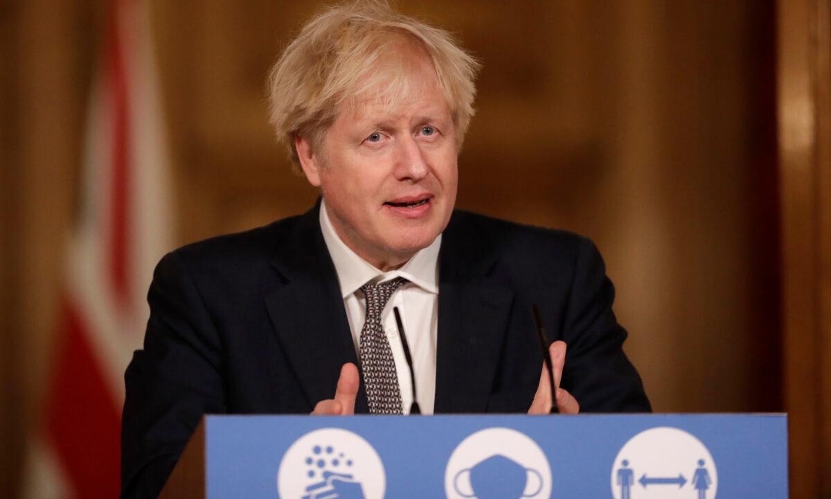 Prime Minister Boris Johnson speaks during a news conference inside 10 Downing Street in London on Dec. 16, 2020. (Matt Dunham/WPA Pool/Getty Images)