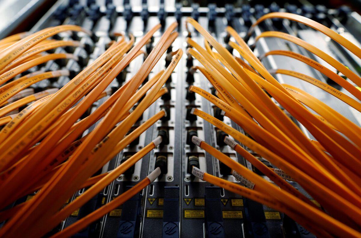 Optical fiber cables are seen in a telephone exchange in Italy in a file photograph. (Alessandro Bianchi/Reuters)