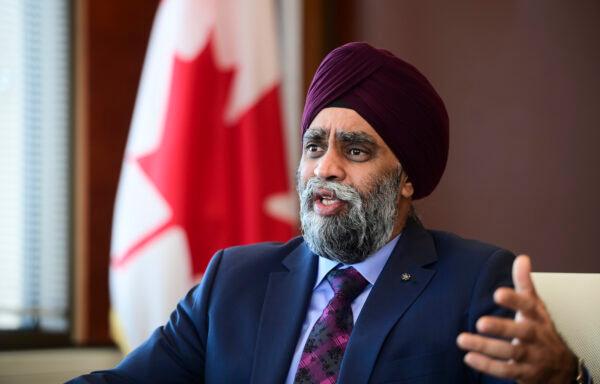 Minister of National Defence Harjit Sajjan takes part in a year-end interview with The Canadian Press at National Defence Headquarters in Ottawa on Dec. 17, 2020. (Sean Kilpatrick/The Canadian Press)