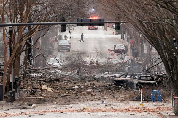 Emergency personnel work near the scene of an explosion in downtown Nashville, Tenn. On Dec. 25, 2020. (Mark Humphrey/AP Photo)