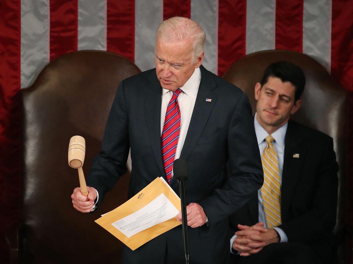 Then-Vice President Joe Biden presides over the counting of electoral votes during a joint session of Congress in Washington on Jan. 6, 2017. (Mark Wilson/Getty Images)