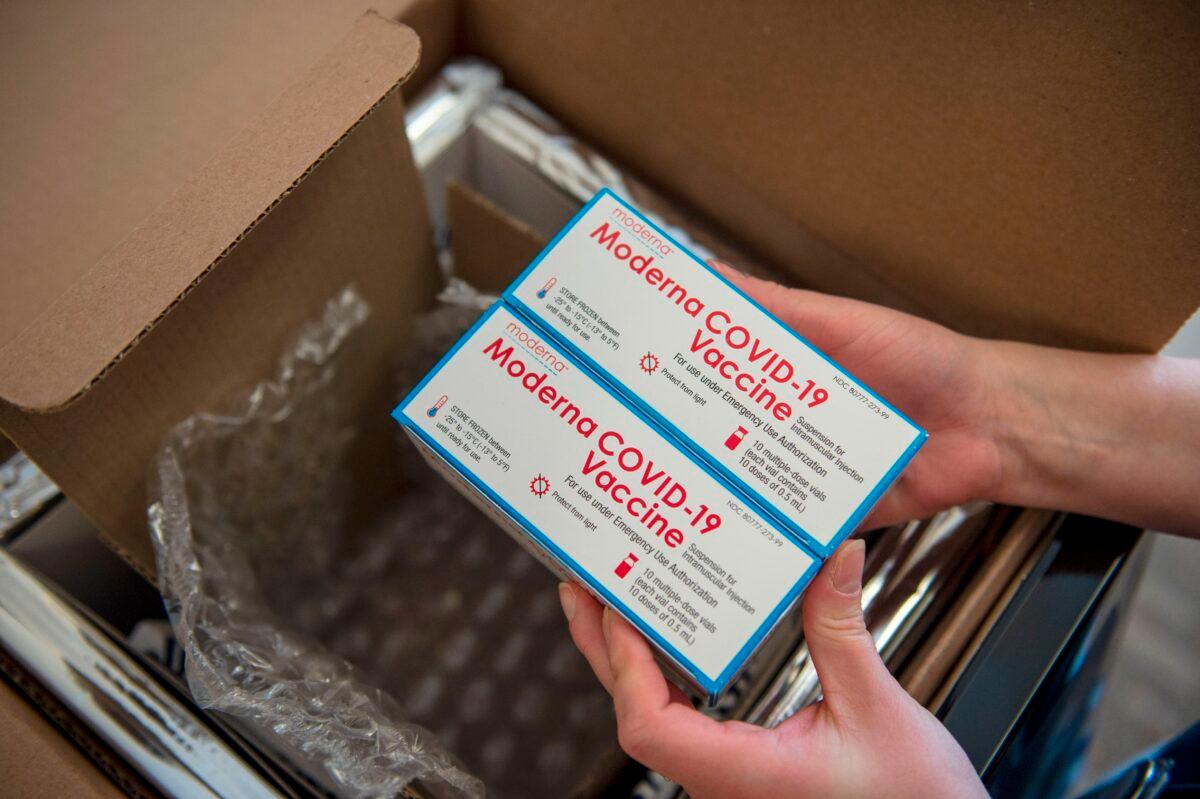 Moderna COVID-19 vaccines are unpacked in Boston on Dec. 24, 2020. (Joseph Prezioso/AFP via Getty Images)