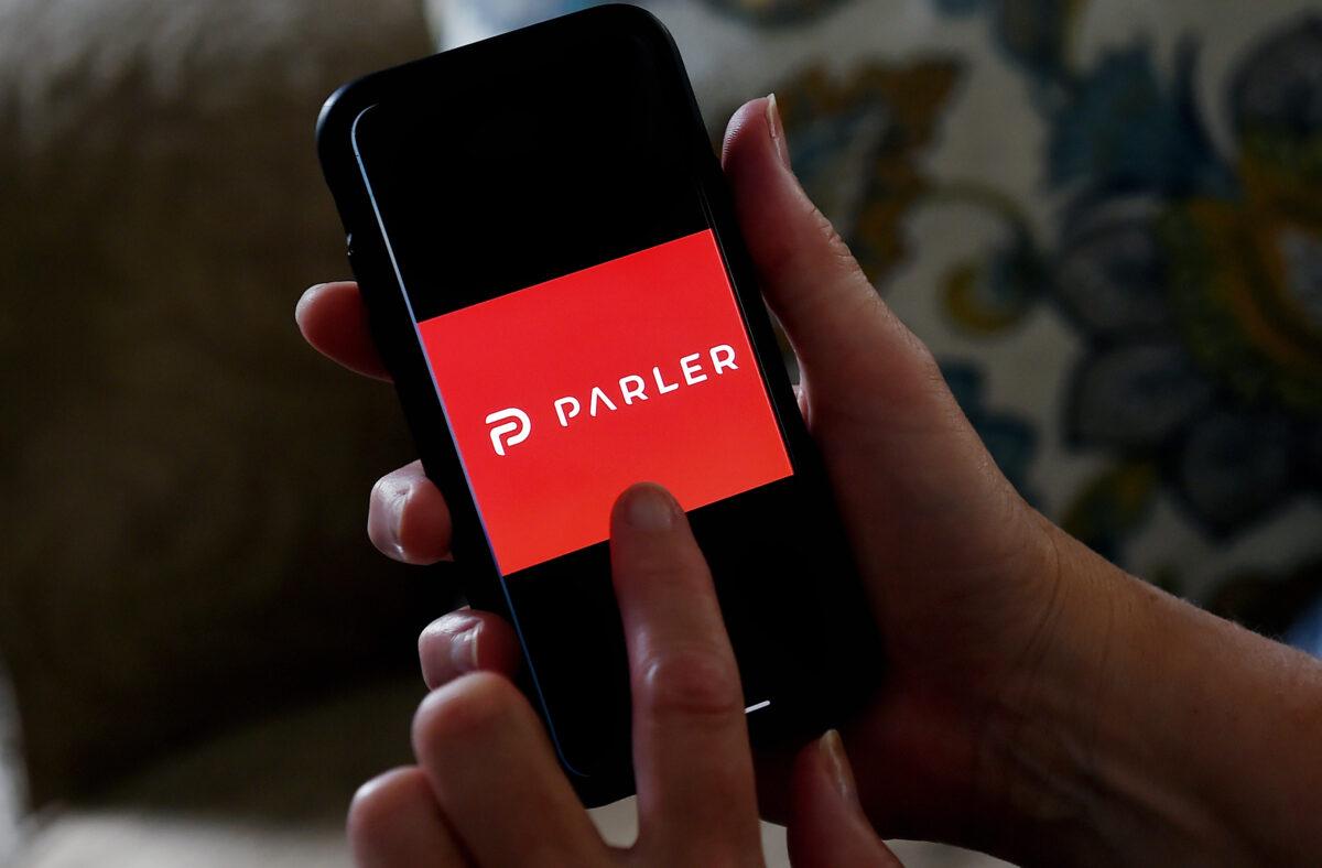 The social media application logo from Parler displayed on a smartphone in Arlington, Va., on July 2, 2020. (Olivier Douliery/AFP via Getty Images)
