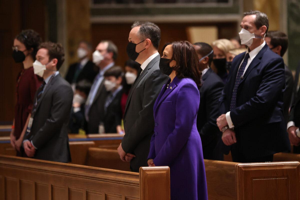 Vice President-elect Kamala Harris (R) and her husband Doug Emhoff attend services at the Cathedral of St. Matthew the Apostle in Washington on Jan. 20, 2021. (Chip Somodevilla/Getty Images)