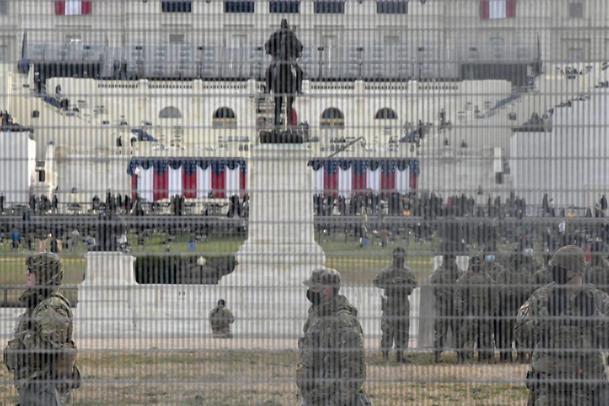 Members of the National Guard gather near the U.S. Capitol before the inauguration of President-elect Joe Biden and Vice President-elect Kamala Harris in Washington on January 20, 2021. (Stephanie Keith/Getty Images)