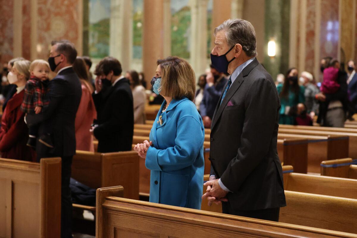 House Speaker Nancy Pelosi (D-Calif.) and her husband Paul Pelosi attend services at the Cathedral of St. Matthew the Apostle in Washington on Jan. 20, 2021. (Chip Somodevilla/Getty Images)