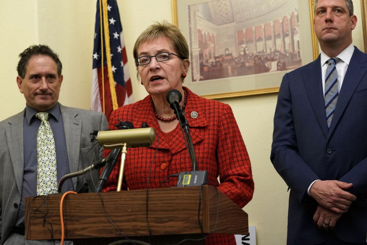 Rep. Marcy Kaptur (D-Ohio) (2nd L) speaks as then Rep.-elect Andy Levin (D-Mich.) (L) and Rep. Tim Ryan (D-Ohio) (R) listen during a news conference in Washington, on Nov. 29, 2018. (Alex Wong/Getty Images)