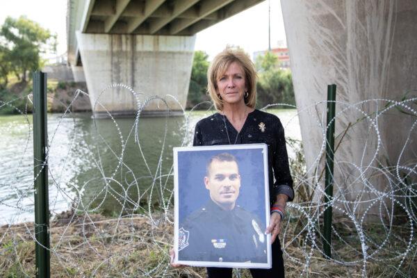 Mary Ann Mendoza, whose son Sgt Brandon Mendoza was killed by an illegal alien, stands next to the Rio Grande, which is the border between the U.S. and Mexico, in Hidalgo, Texas, on Nov. 5, 2018. (Samira Bouaou/The Epoch Times)