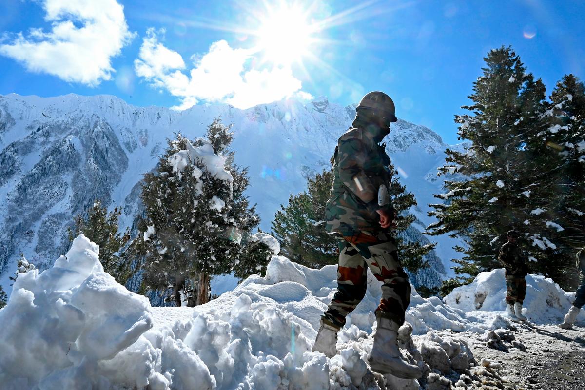 Indian army soldiers near Zojila mountain pass that connects Srinagar to the union territory of Ladakh, bordering China, on Nov. 26, 2020. (Tauseef Mustafa/AFP via Getty Images)