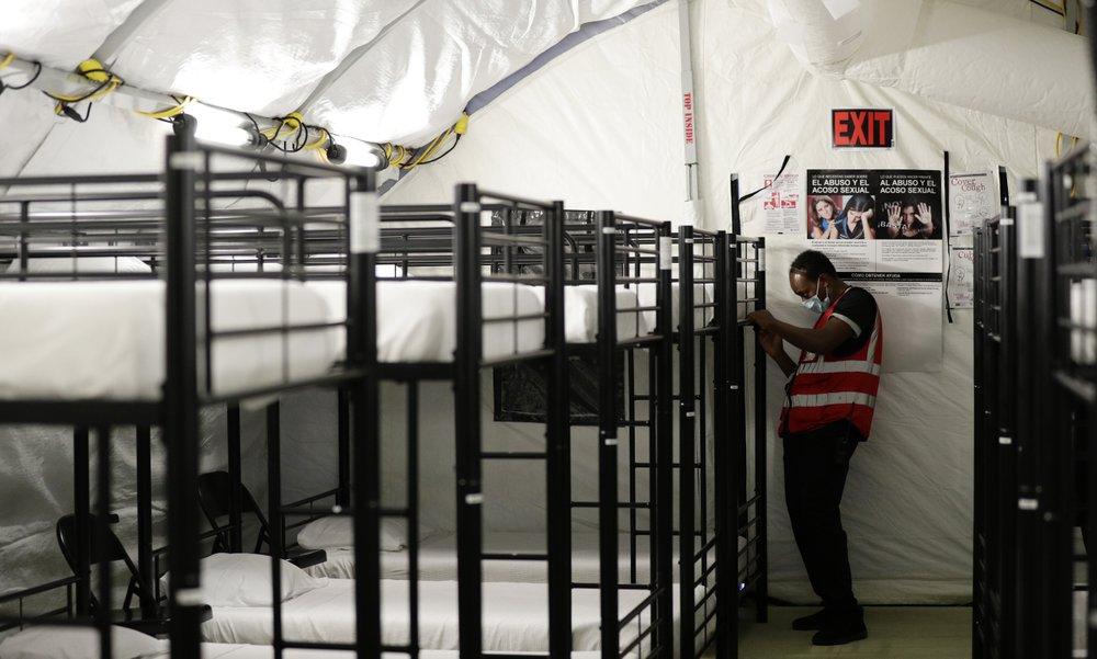 A staff member works in the infirmary, a series of tents, at a U.S. government holding facility in Carrizo Springs, Texas, on July 9, 2019. (Eric Gay/AP Photo)