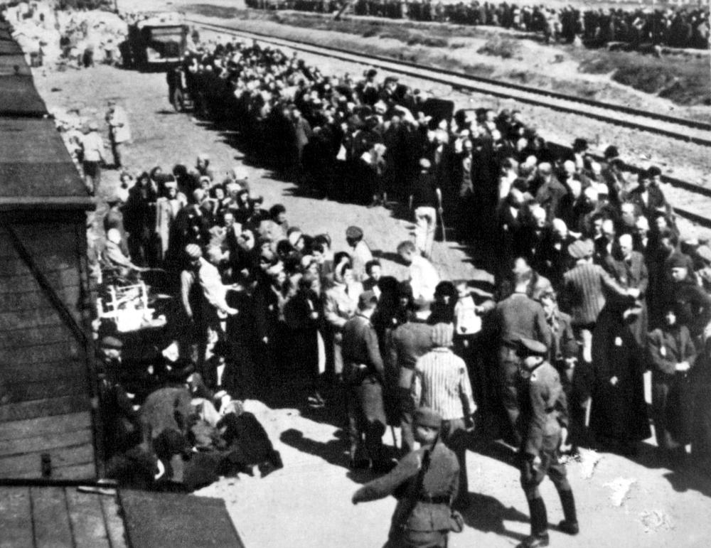 This photo depicts the sorting of prisoners at the Auschwitz-Birkenau concentration camp station in Poland, around 1944.(Everett Collection/Shutterstock)