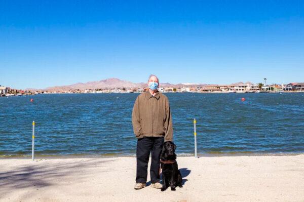 Michael Hingson with his guide dog Alamo in Victorville, Calif. on Feb. 4, 2021. (John Fredricks/The Epoch Times)