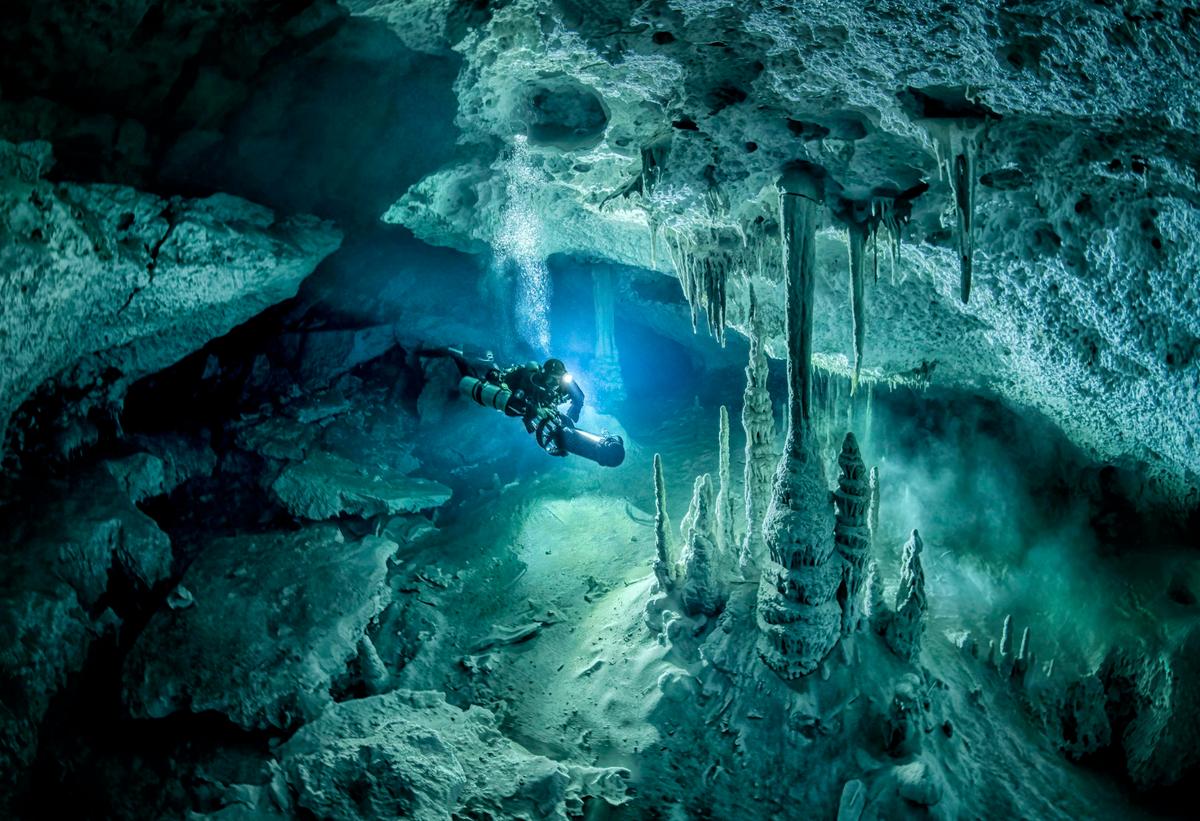 Martin Broen explores the otherworldly landscapes of underwater caves and cenotes along the Riviera Maya in Mexico. (Caters News)