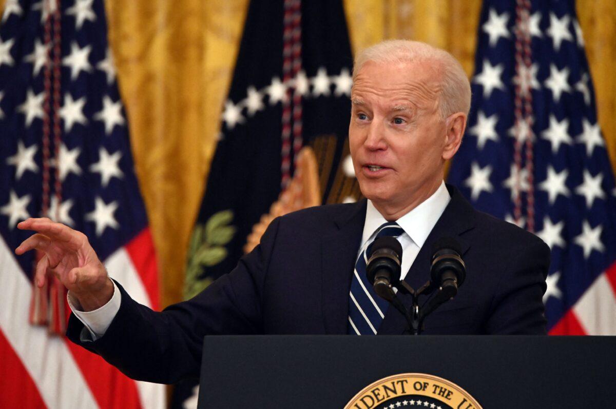 President Joe Biden answers a question during his first press briefing in the East Room of the White House on March 25, 2021. (Jim Watson/AFP via Getty Images)