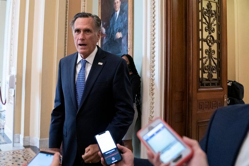 Sen. Mitt Romney (R-Utah) speaks to reporters at the Capitol in Washington on Sept. 21, 2020. (Stefani Reynolds/Getty Images)
