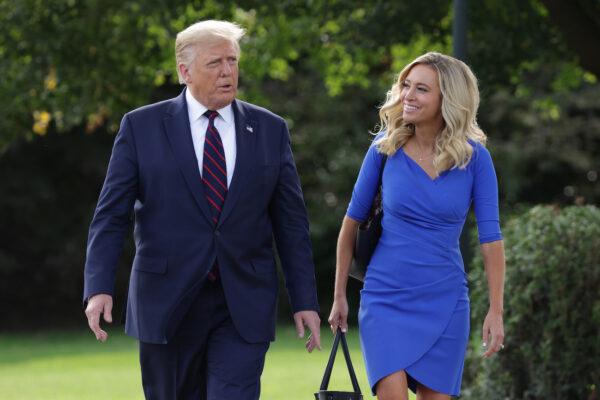 Then-President Donald Trump and White House Press Secretary Kayleigh McEnany walk toward members of the press in Washington, Sept. 15, 2020. (Alex Wong/Getty Images)